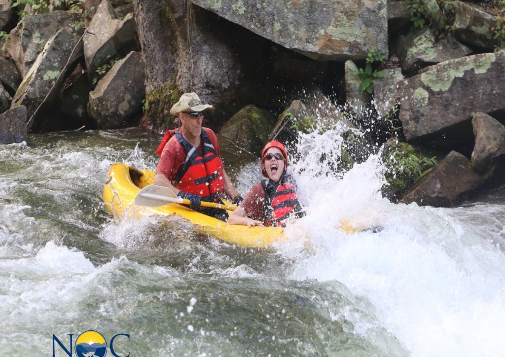 Father and Son enjoy the rapids
